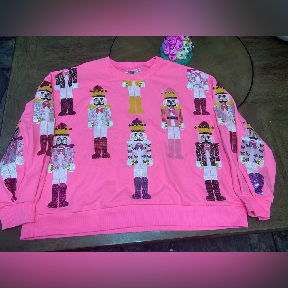QOS, hot pink nutcracker sweatshirt,worn once last christmas, s